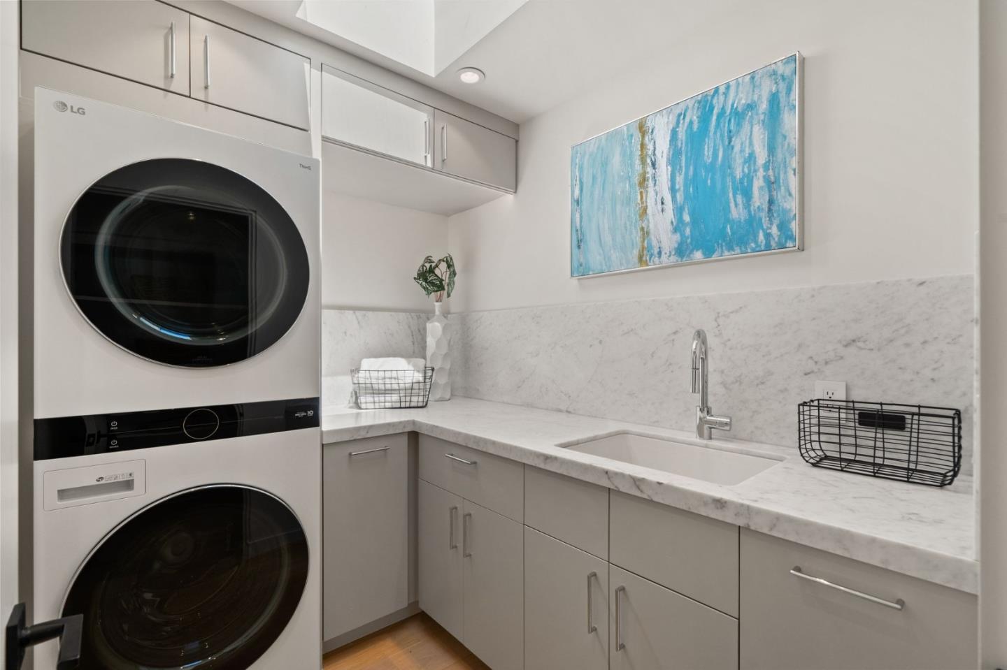 161 Eleanor Drive Woodside, CA 94062 - Photo 34 of 57 a bathroom with a sink and a washer dryer