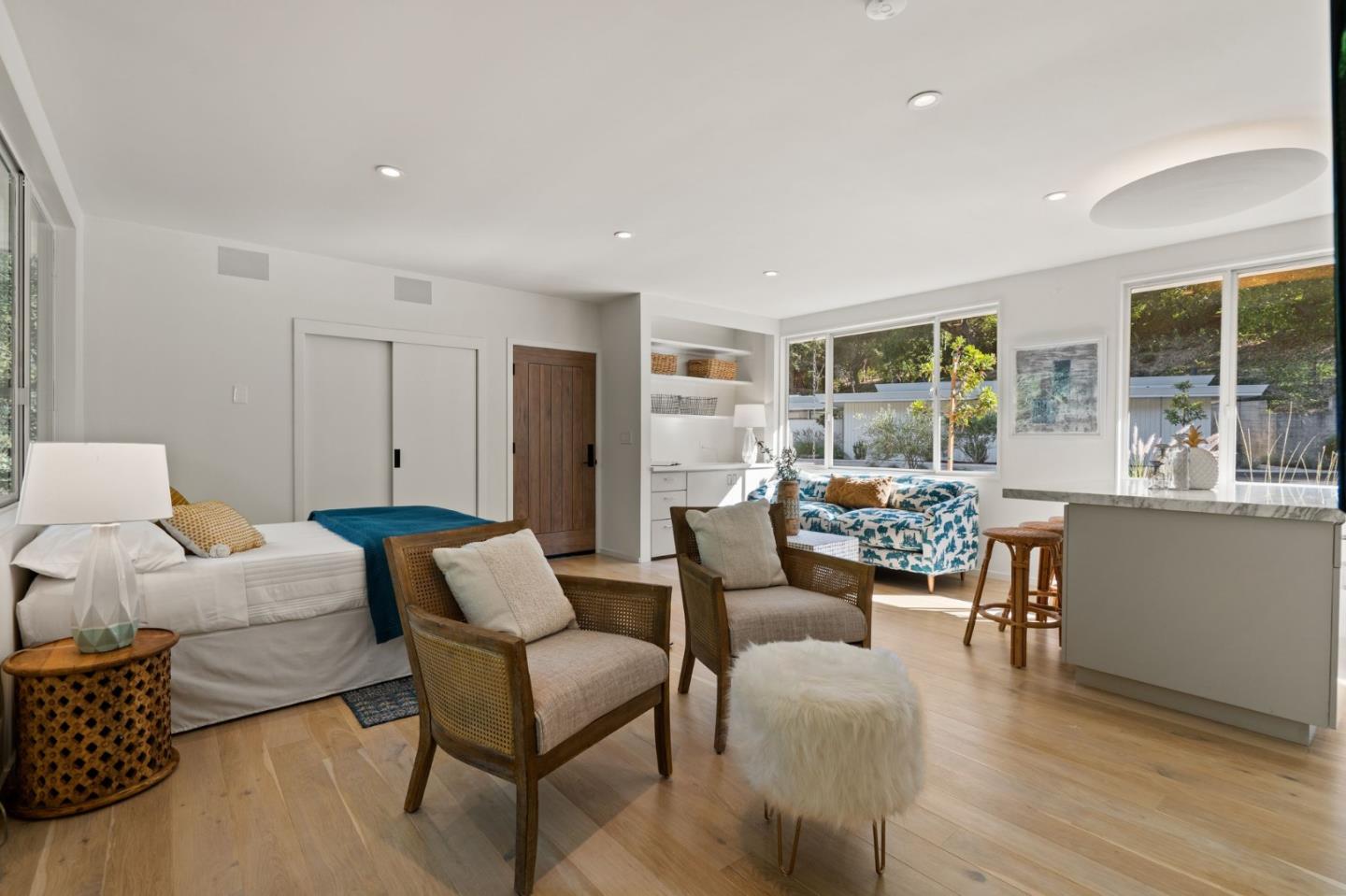 161 Eleanor Drive Woodside, CA 94062 - Photo 37 of 57 a living room with furniture and a large window