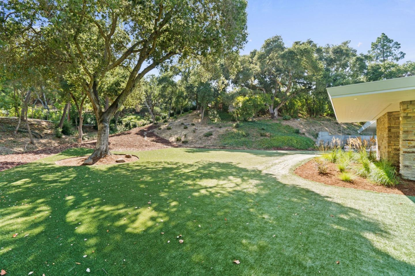 161 Eleanor Drive Woodside, CA 94062 - Photo 46 of 57 a view of a backyard with a fountain
