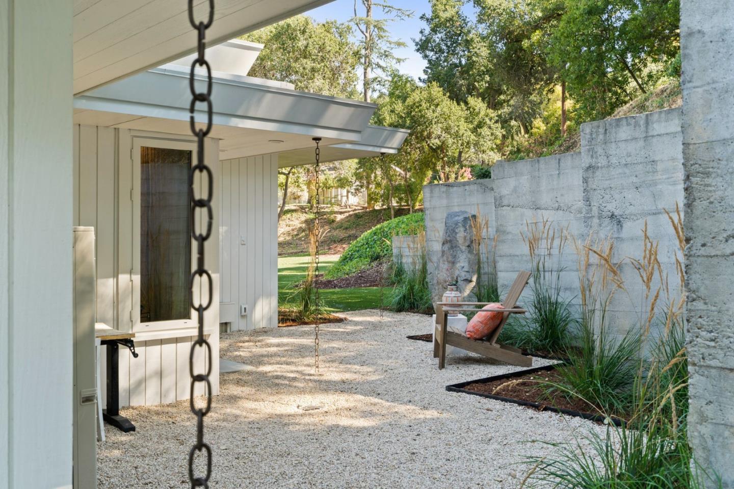 161 Eleanor Drive Woodside, CA 94062 - Photo 47 of 57 a backyard of a house with yard and outdoor seating