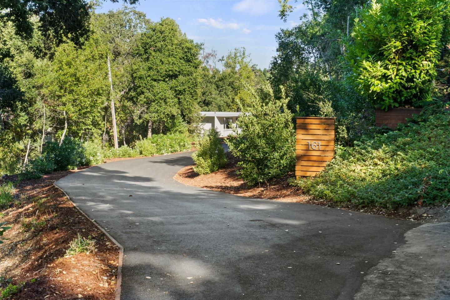 161 Eleanor Drive Woodside, CA 94062 - Photo 49 of 57 a view of a yard with plants and trees