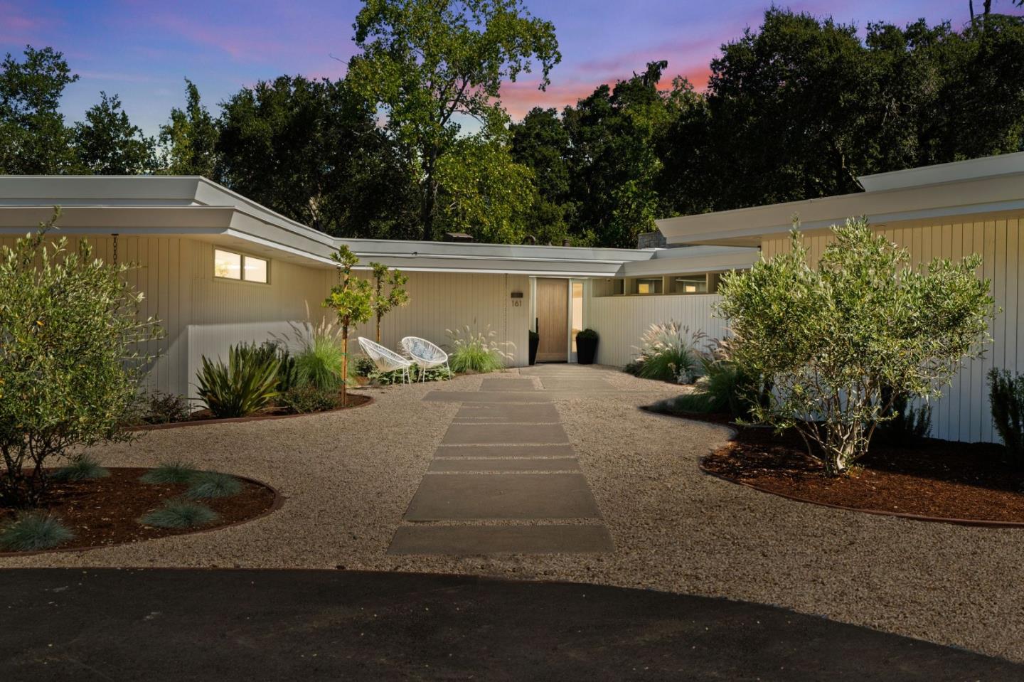 161 Eleanor Drive Woodside, CA 94062 - Photo 50 of 57 a front view of a house with a yard