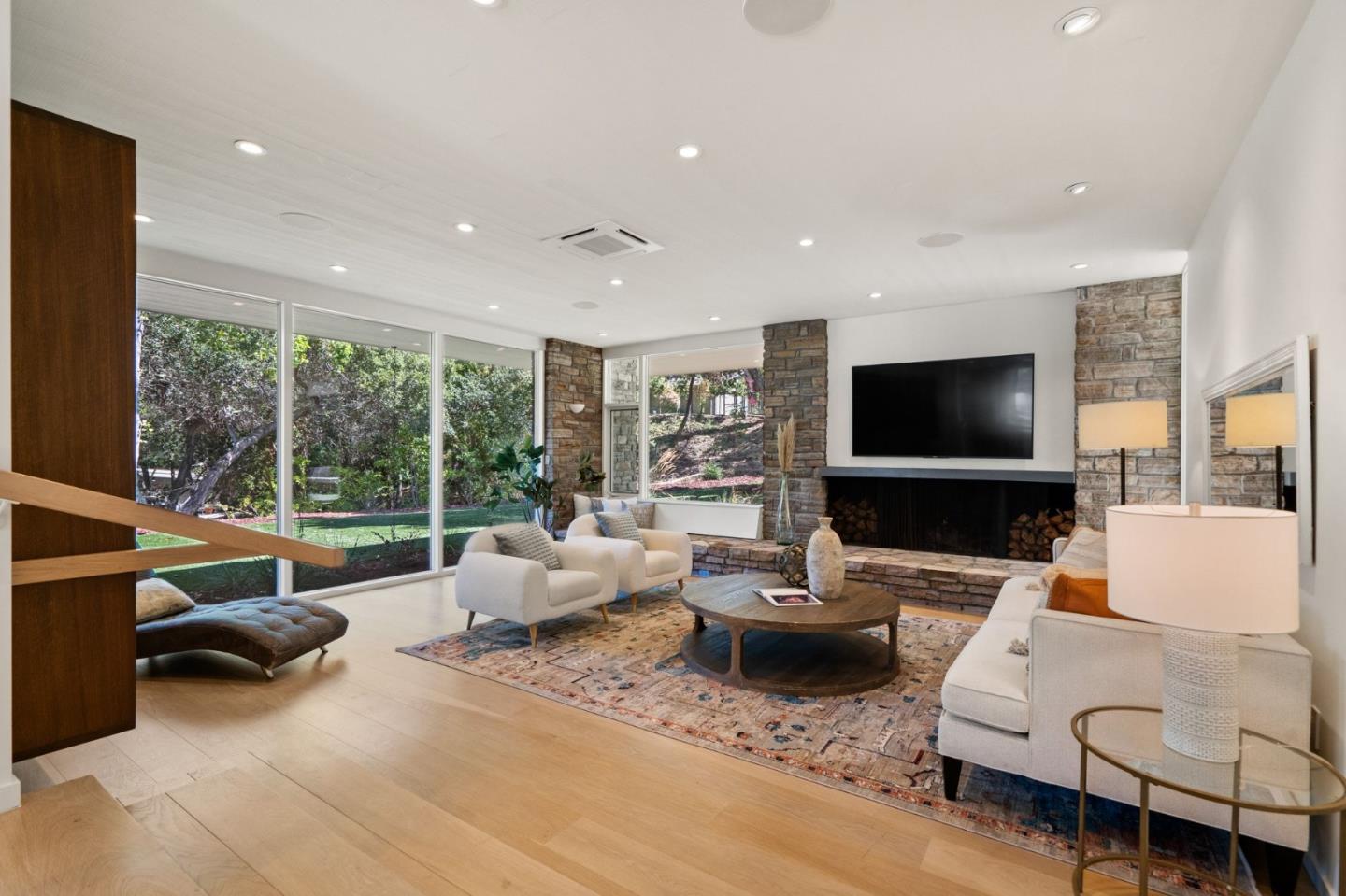 161 Eleanor Drive Woodside, CA 94062 - Photo 6 of 57 a living room with furniture and a flat screen tv