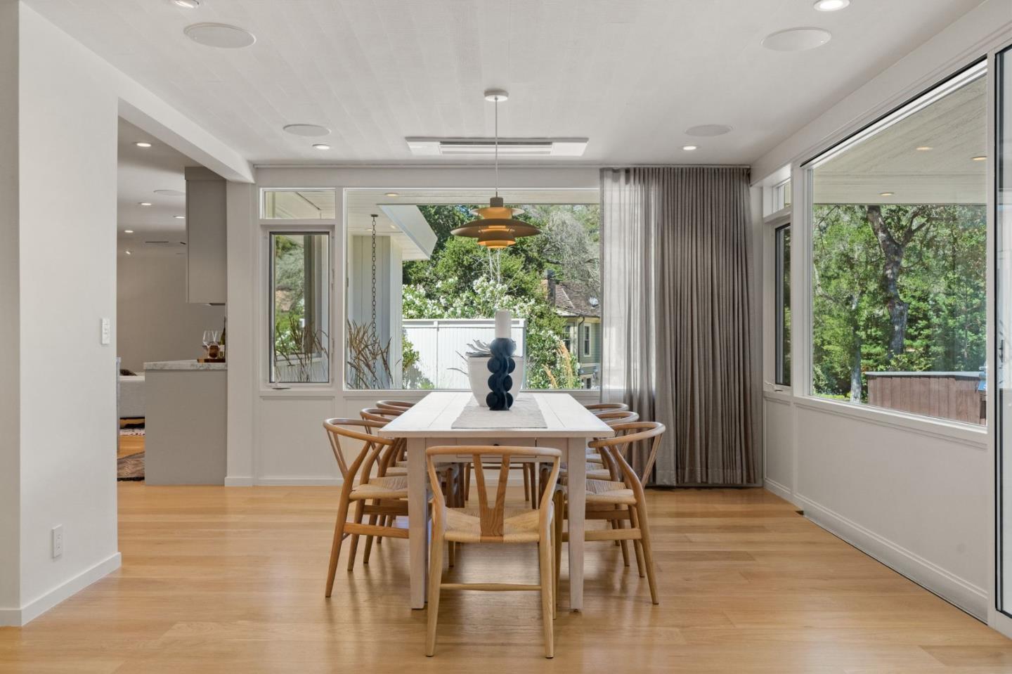 161 Eleanor Drive Woodside, CA 94062 - Photo 8 of 57 a dining room with furniture window outside view and wooden floor