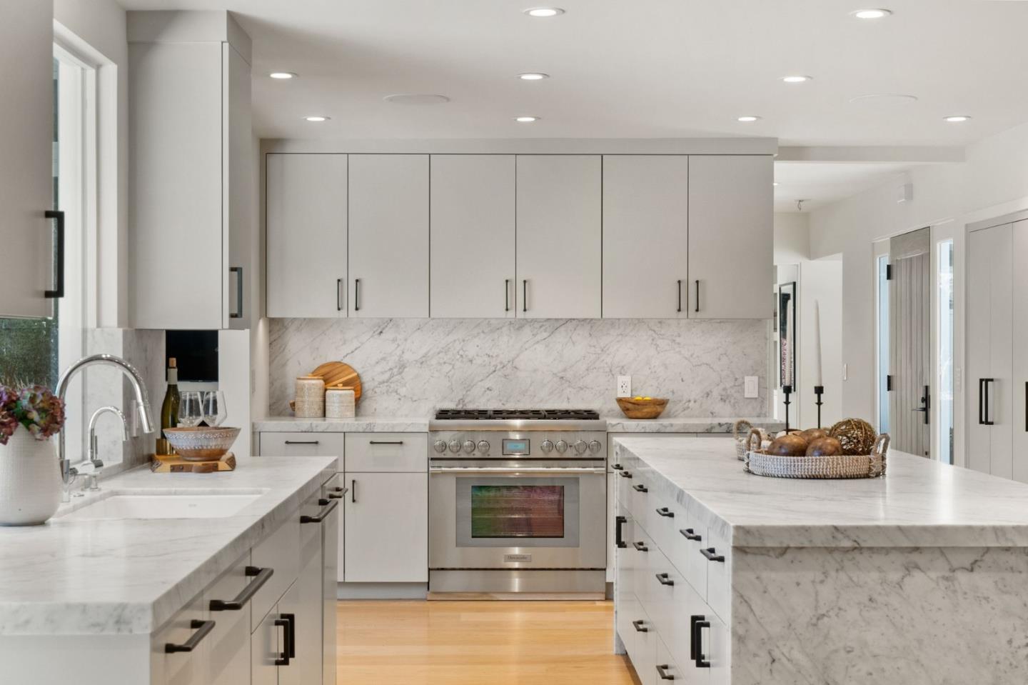 161 Eleanor Drive Woodside, CA 94062 - Photo 9 of 57 a kitchen with granite countertop a sink stainless steel appliances and cabinets