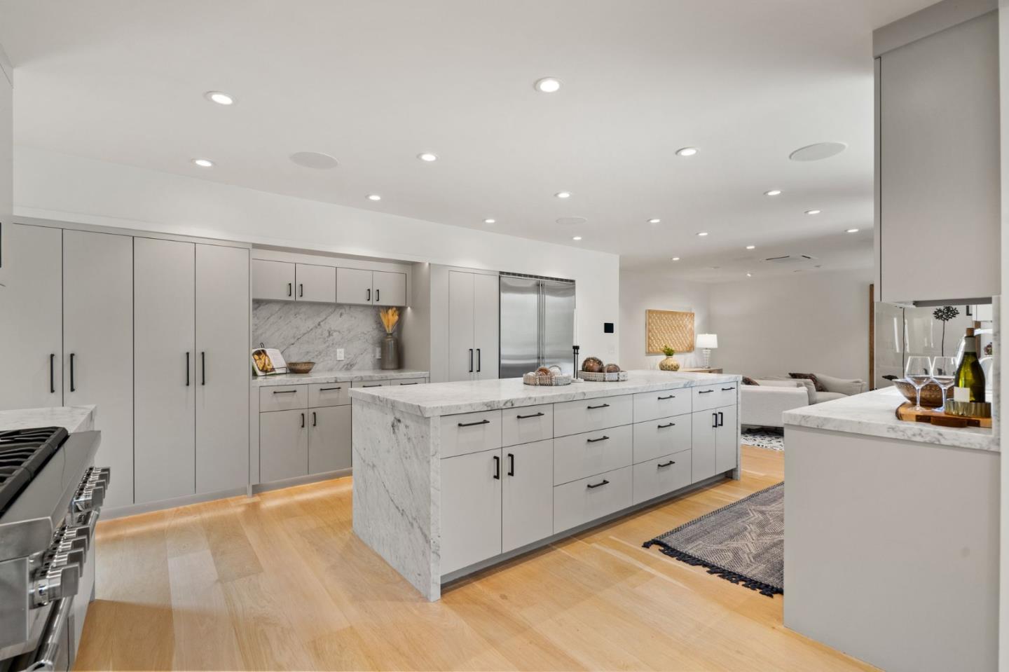 161 Eleanor Drive Woodside, CA 94062 - Photo 10 of 57 a large kitchen with kitchen island a sink a stove a refrigerator and a cabinets