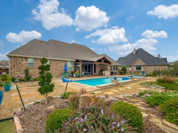 a view of house with outdoor space