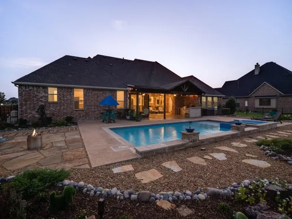 a house view with a garden space
