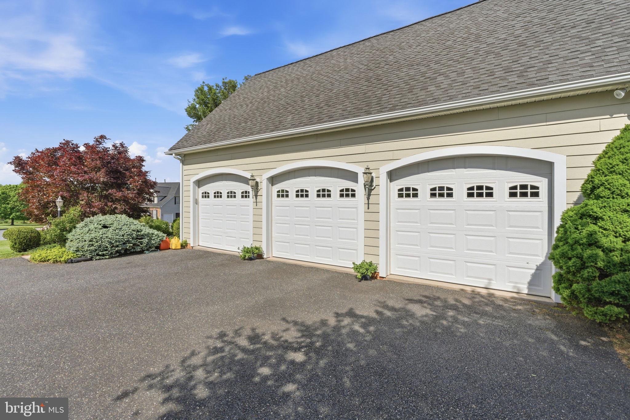 9 Deer Ridge Court Phoenix, MD 21131 - Photo 89 of 96 a front view of a house with a garage