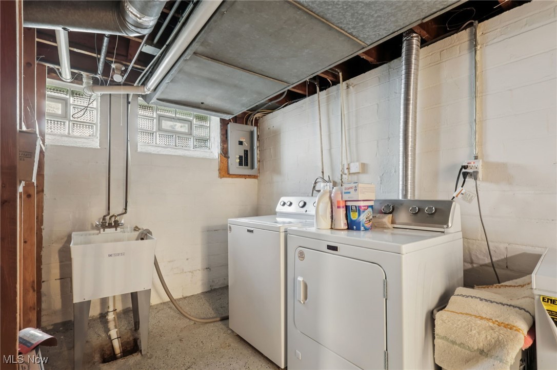 1503 Oakmount Road South Euclid, OH 44121 - Photo 41 of 50 Laundry room featuring separate washer and dryer and electric panel