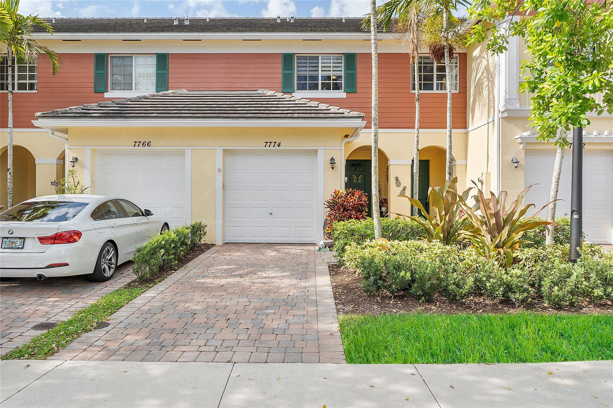 Exterior 1 car garage and driveway