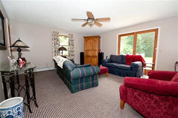 85 Maple Road Longmeadow, MA 01106 - Photo 12 of 30 a living room with furniture ceiling fan and a window