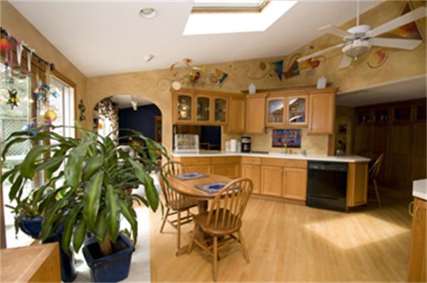 85 Maple Road Longmeadow, MA 01106 - Photo 13 of 30 a view of a dining room kitchen with furniture and a chandelier