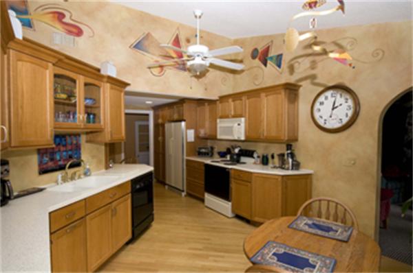 85 Maple Road Longmeadow, MA 01106 - Photo 20 of 30 a kitchen with a cabinets and chandelier