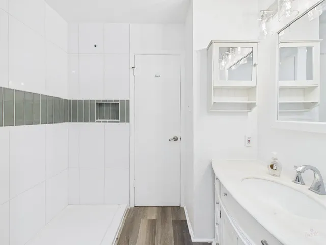 a bathroom with a sink and a bathtub