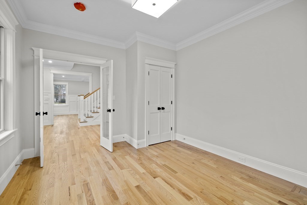20 Harding Road Lexington, MA 02420 - Photo 11 of 41 wooden floor with white walls