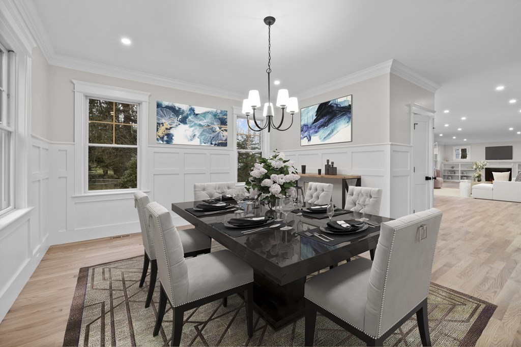 20 Harding Road Lexington, MA 02420 - Photo 2 of 41 a dining room with furniture a chandelier and wooden floor