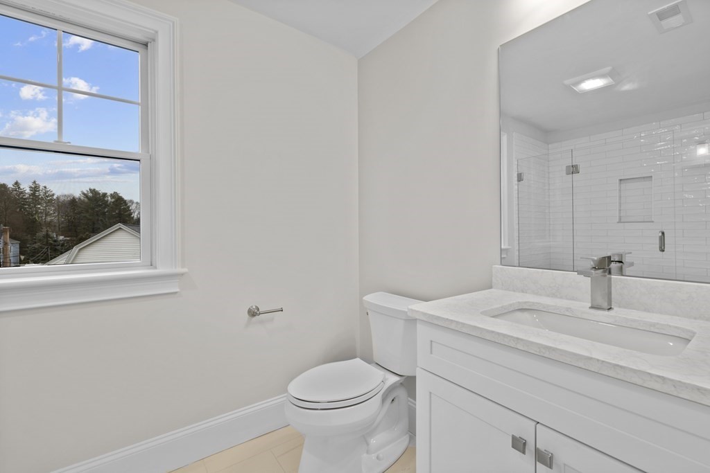 20 Harding Road Lexington, MA 02420 - Photo 29 of 41 a bathroom with a sink toilet and vanity