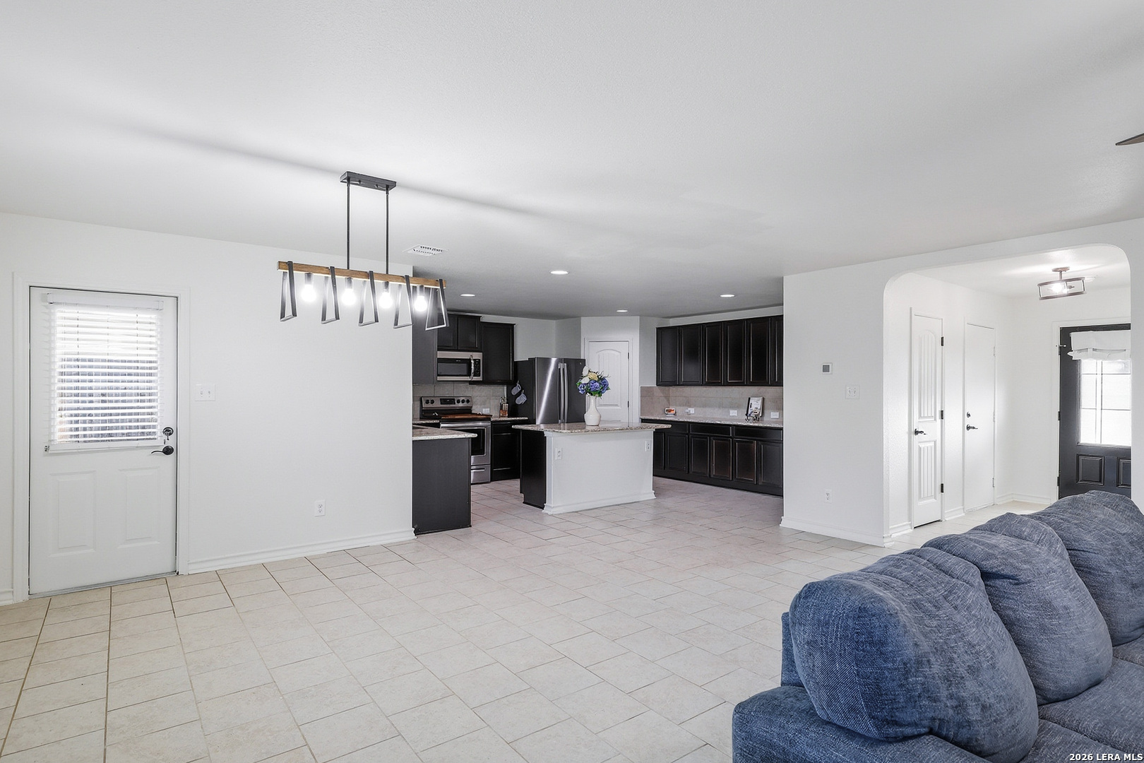 7435 Rigel Chase San Antonio, TX 78252 - Photo 11 of 38 a open kitchen with cabinets and stainless steel appliances