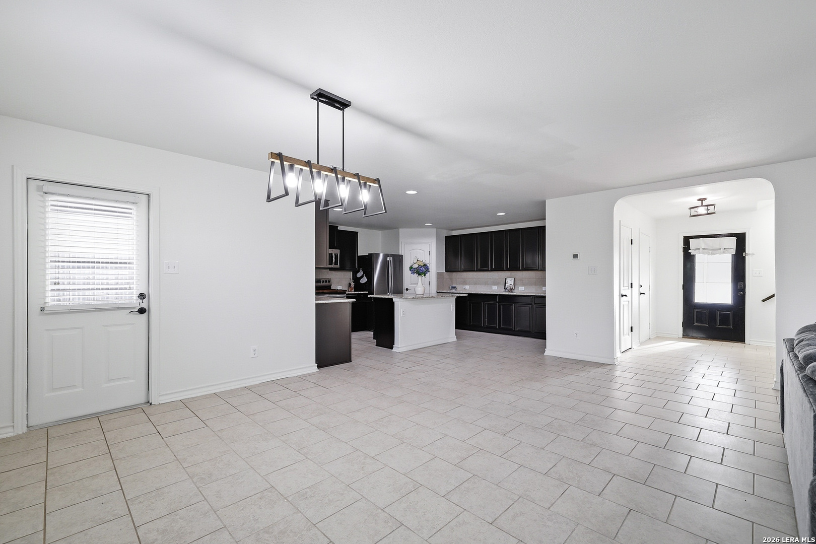 7435 Rigel Chase San Antonio, TX 78252 - Photo 14 of 38 a view of a kitchen with a sink and cabinet area
