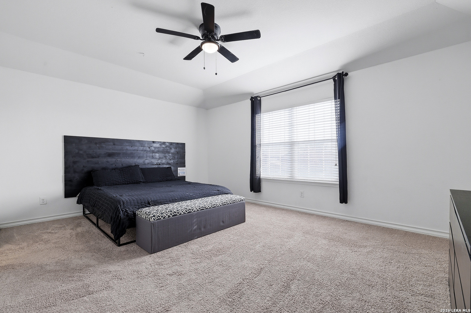 7435 Rigel Chase San Antonio, TX 78252 - Photo 27 of 38 a living room with furniture and a ceiling fan