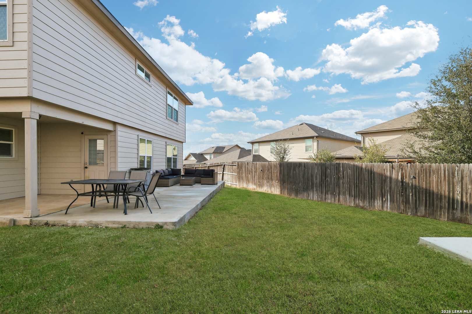 7435 Rigel Chase San Antonio, TX 78252 - Photo 34 of 38 a view of a backyard with a garden and entertaining space