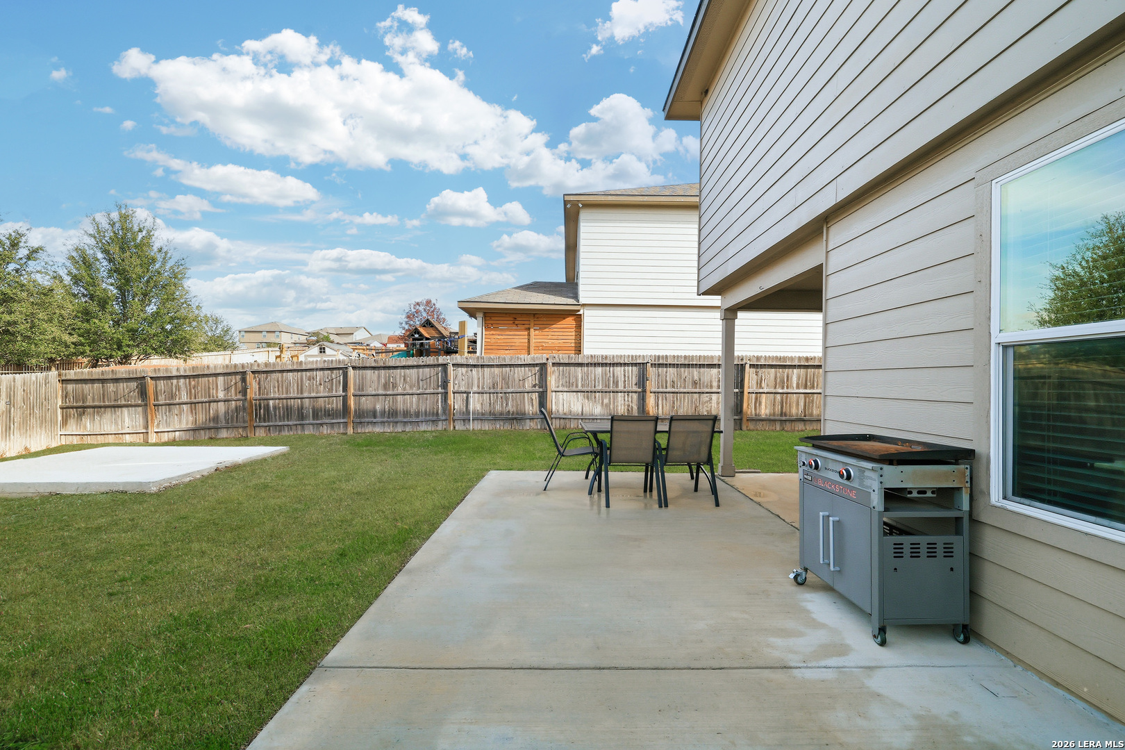 7435 Rigel Chase San Antonio, TX 78252 - Photo 35 of 38 a view of a backyard with sitting area