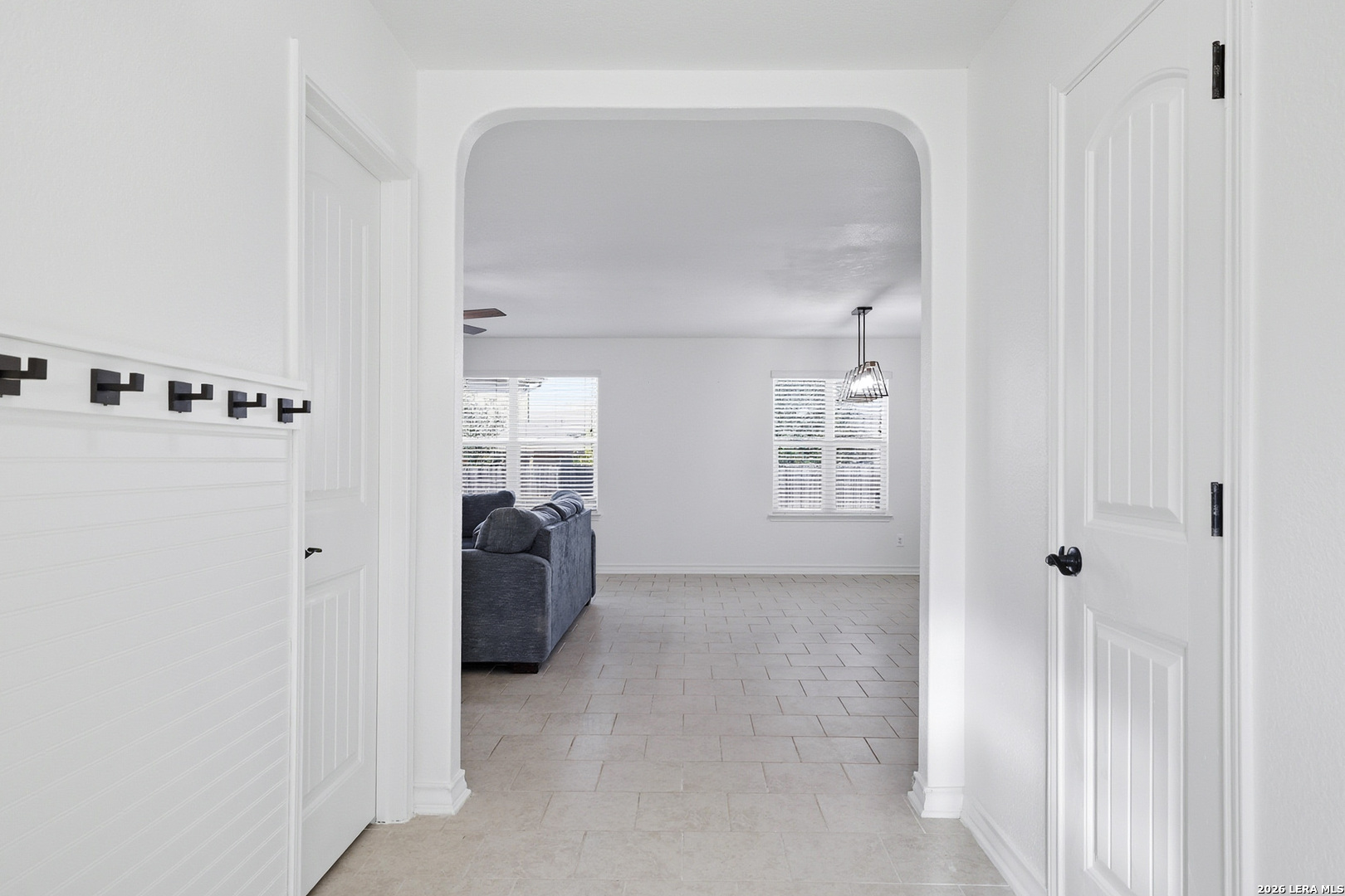 7435 Rigel Chase San Antonio, TX 78252 - Photo 7 of 38 a view of a closet area with living room