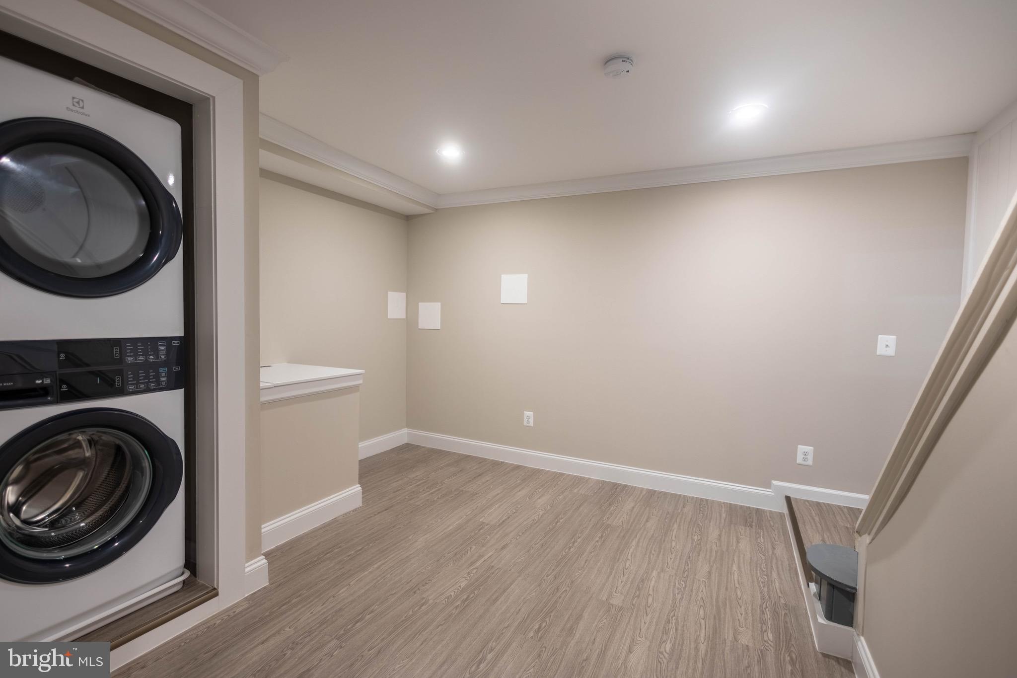 2846 Lake Avenue Baltimore, MD 21213 - Photo 24 of 28 a view of a hallway with washer and dryer