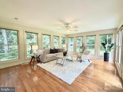 a bathroom with a sink toilet and mirror