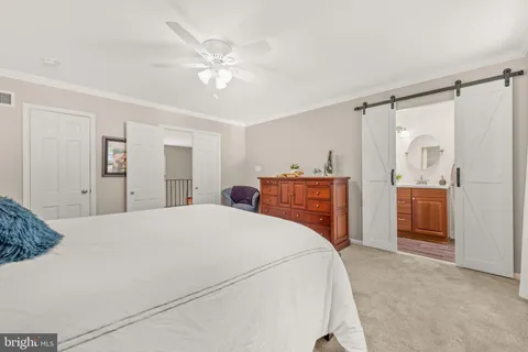 a bathroom with a sink and a window