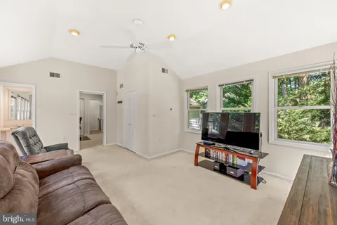 a view of a field with an trees