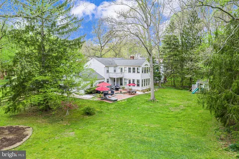 a view of a field with trees