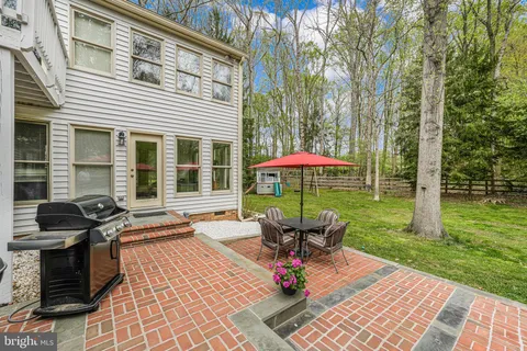 a balcony with lots of green space