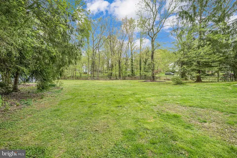an aerial view of residential house with outdoor space