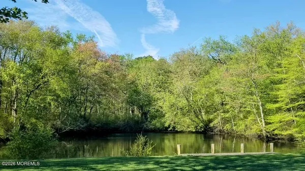 a view of a lake with houses