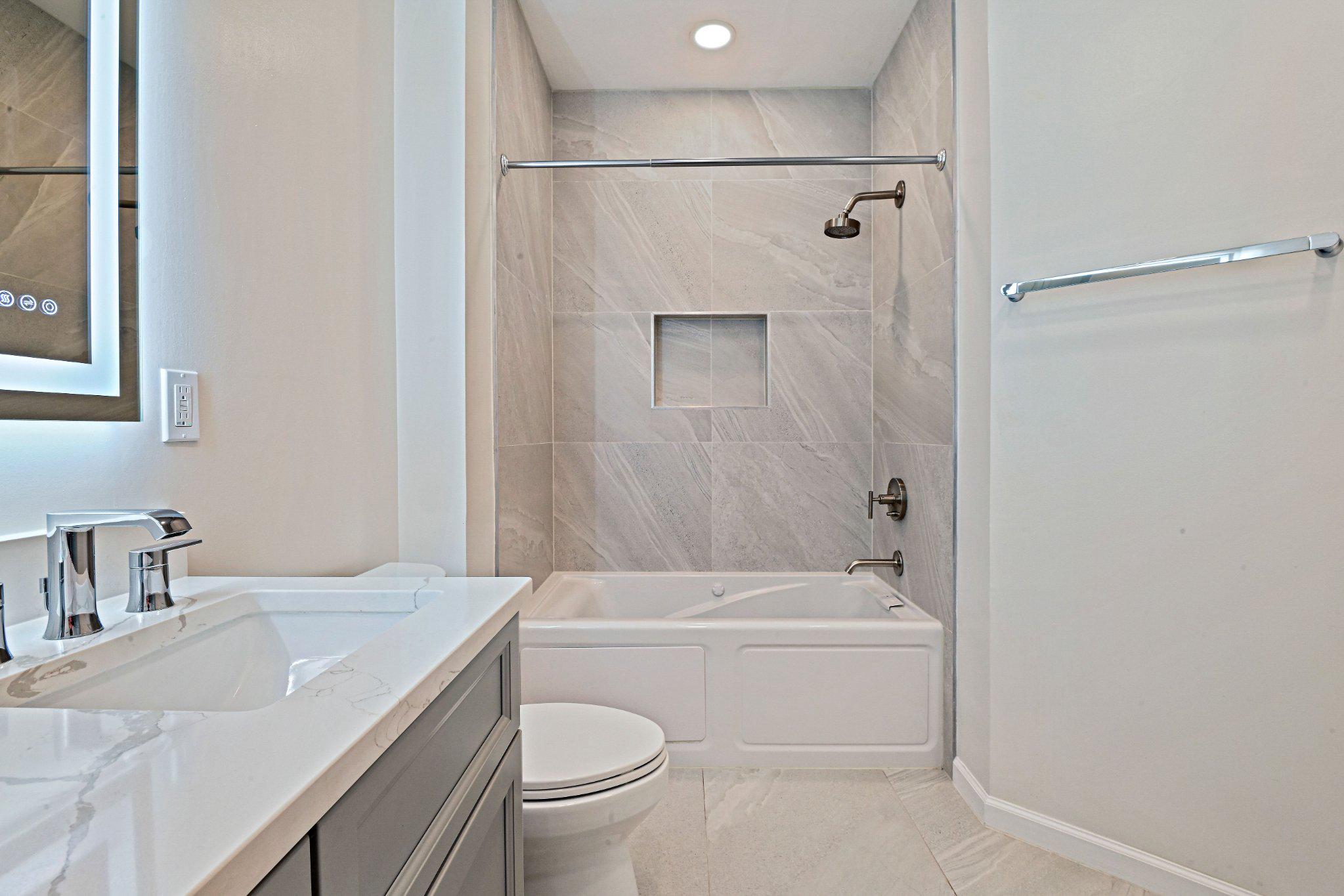 1519 North Point Drive, Unit 202 Reston, VA 20194 - Photo 36 of 49 Modern bathroom with jacuzzi bathtub.
