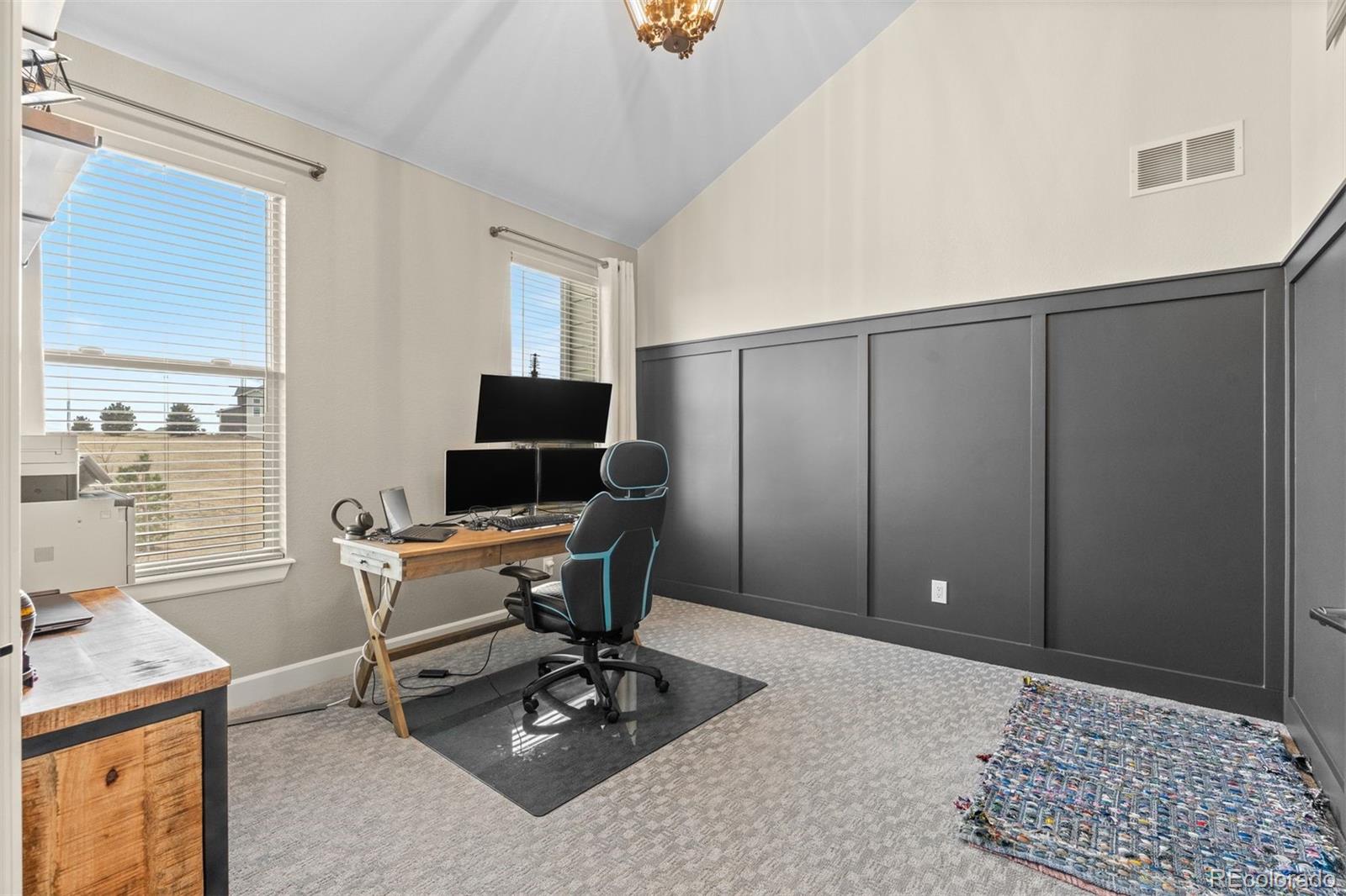 32335 Legacy Ridge Street Elizabeth, CO 80107 - Photo 23 of 50 a workspace with furniture and window