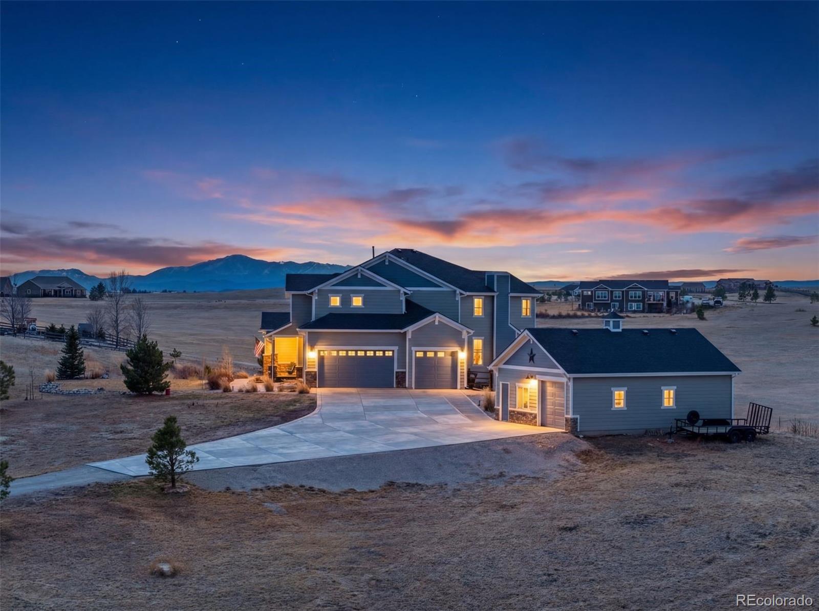 32335 Legacy Ridge Street Elizabeth, CO 80107 - Photo 3 of 50 a front view of a house with a yard