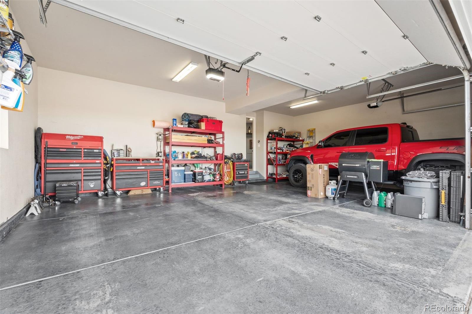 32335 Legacy Ridge Street Elizabeth, CO 80107 - Photo 39 of 50 a view of a garage with furniture