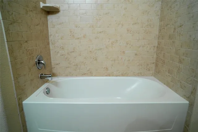 a bathroom with a bathtub