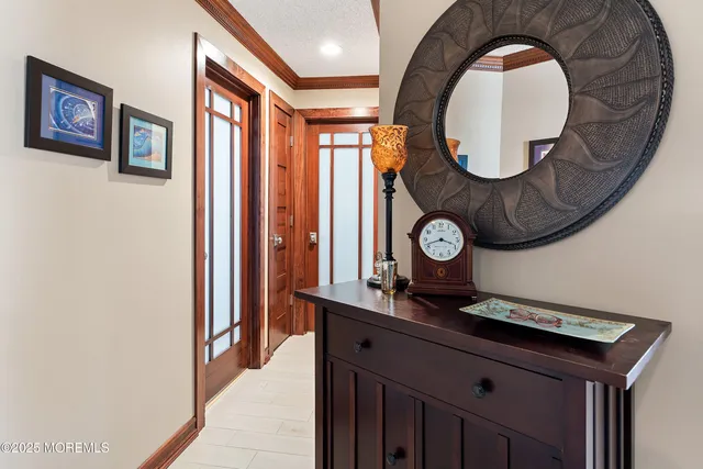 a view of a hallway with washer and dryer