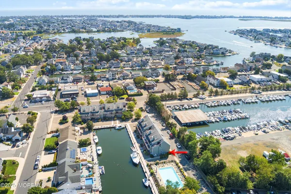 an aerial view of lake and city