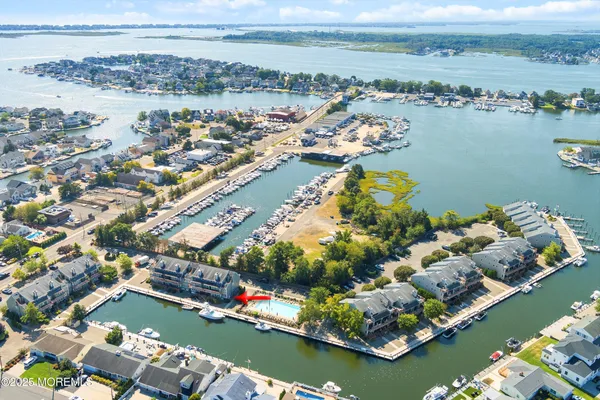 an aerial view of a city with lawn chairs