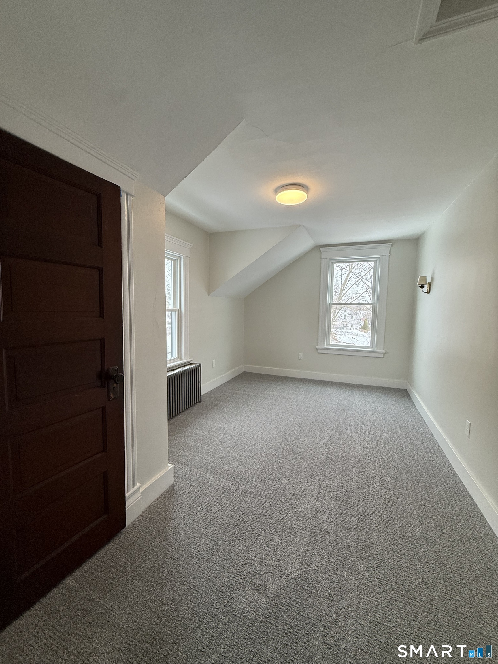 an empty room with windows