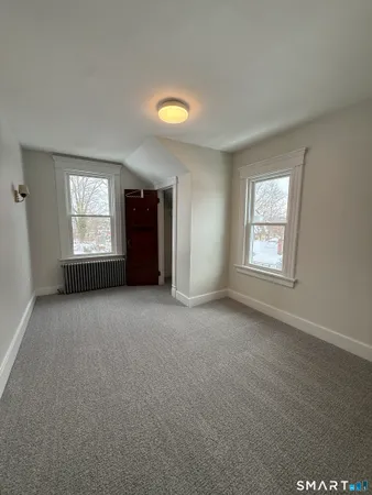 a view of a room that has a window