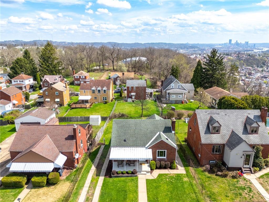 416 Phillips Avenue McKees Rocks, PA 15136 - Photo 41 of 46 aerial view of a house with a big yard