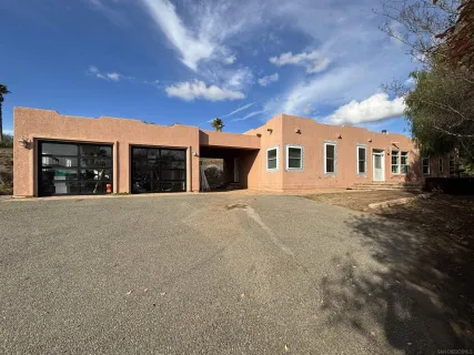 front view of a house with a big yard