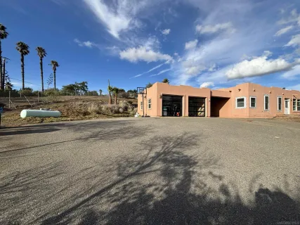 a view of a house with a large space