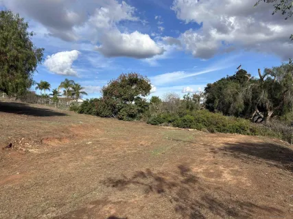 a view of a road with a building in the background